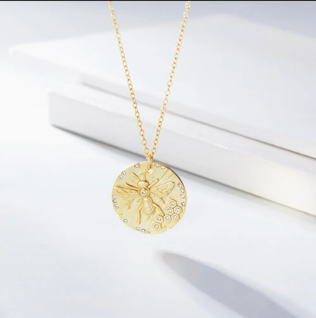 Gold Bee Coin Necklace back view on white background