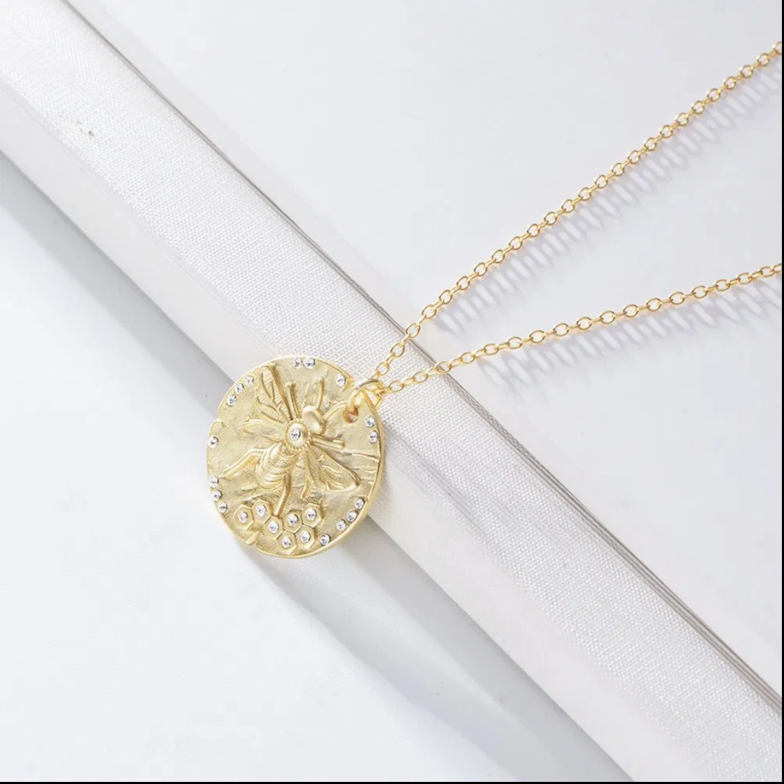 Gold Bee Coin Necklace close-up detail
